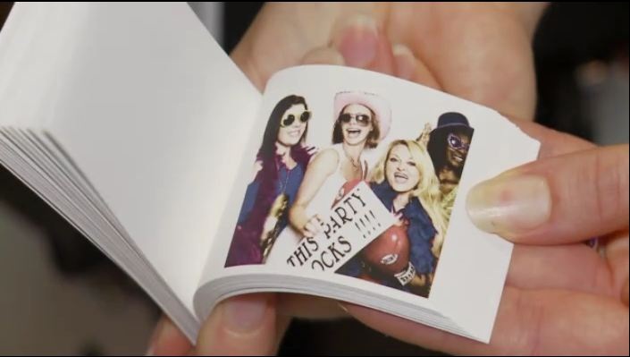 images shows hand holding a photo flip book